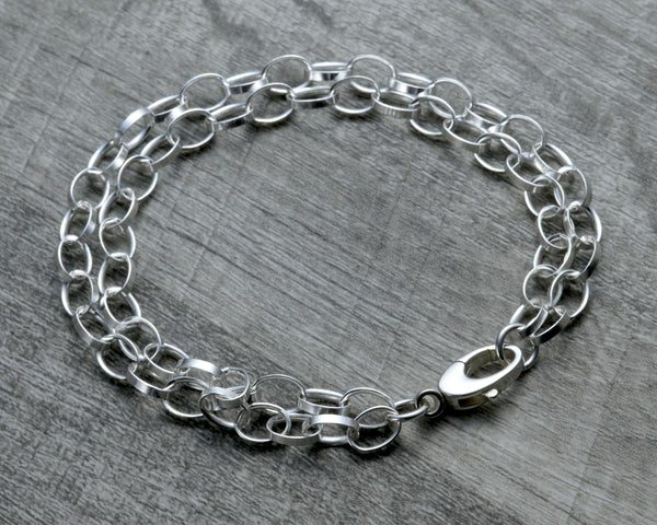 LAYERED STERLING SILVER CHARM BRACELET